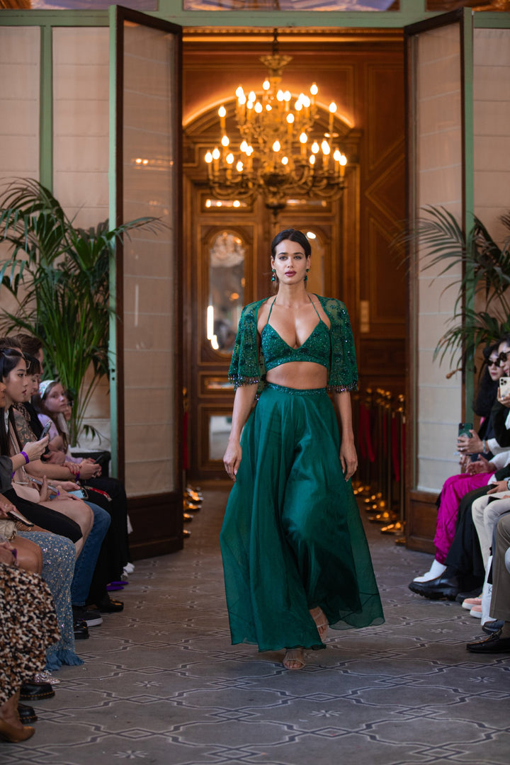 Green embroidered bustier with cape and flared palazzo