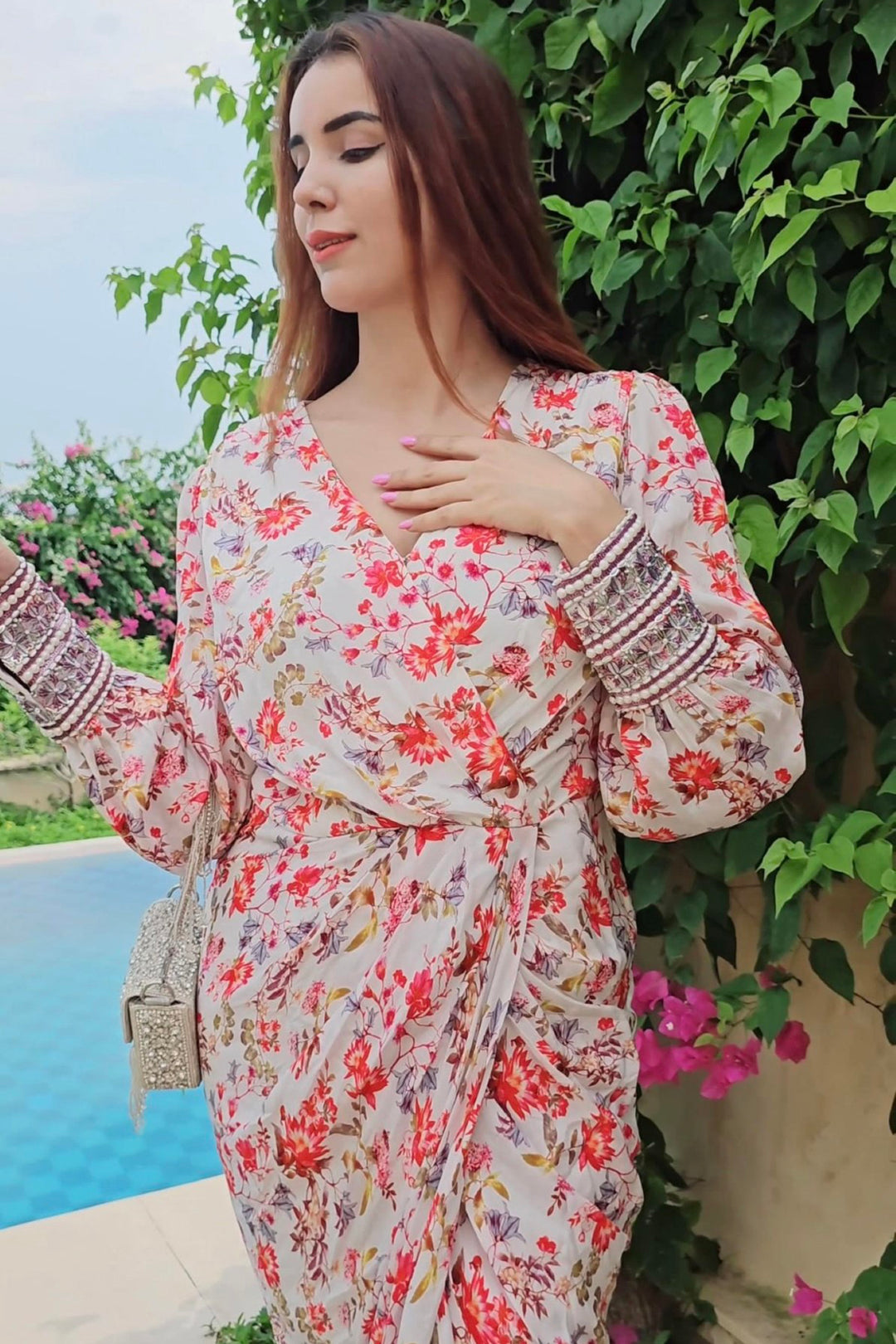 Influencer Jasleen in white printed drape dress