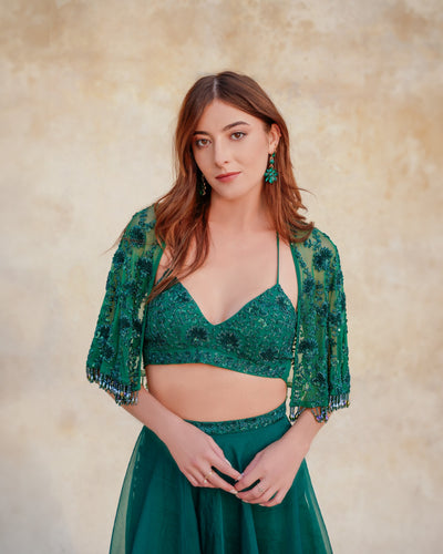 Green embroidered bustier with cape and flared palazzo
