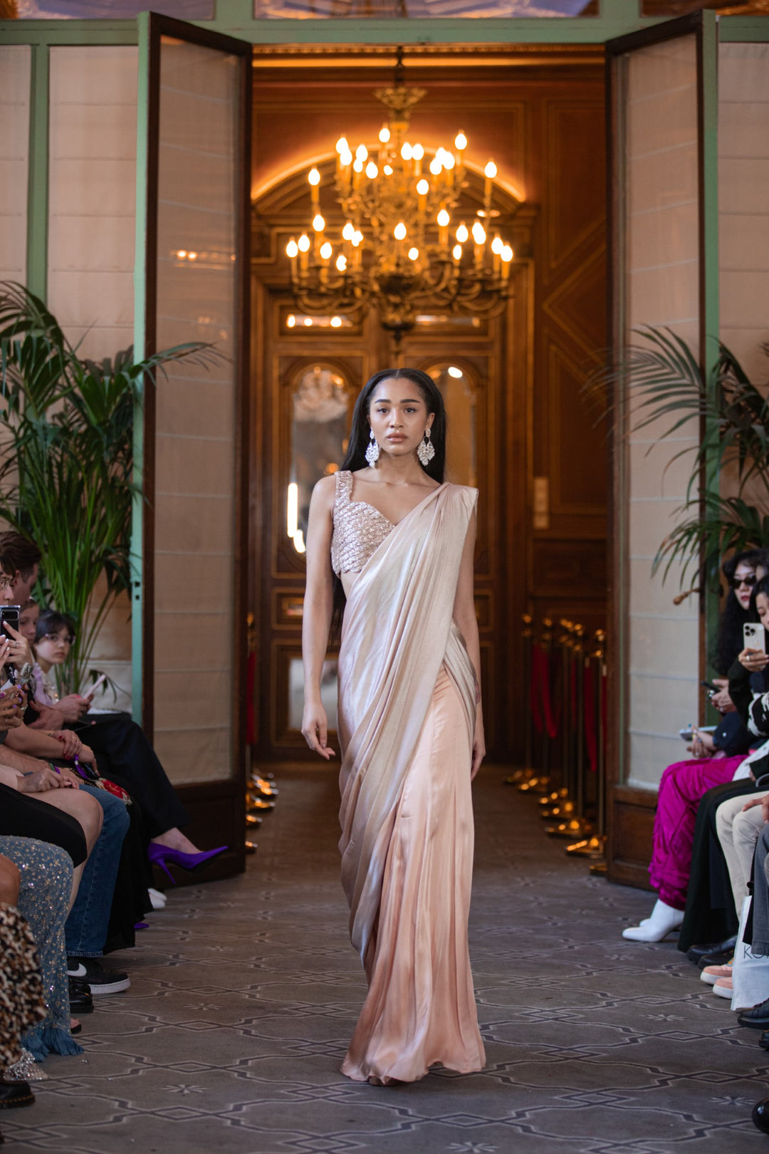 Nude coloured pre-stitched saree with embroidered blouse