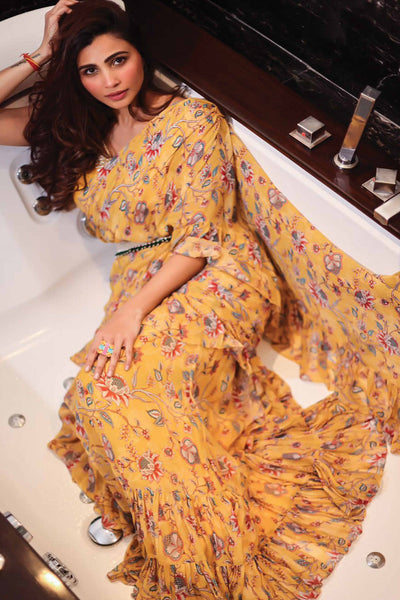Actress Daisy Shah In Yellow Printed Frill Saree Set